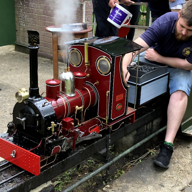 Picture of a model narrow gauge steam engine. Click here to find some videos and videographers